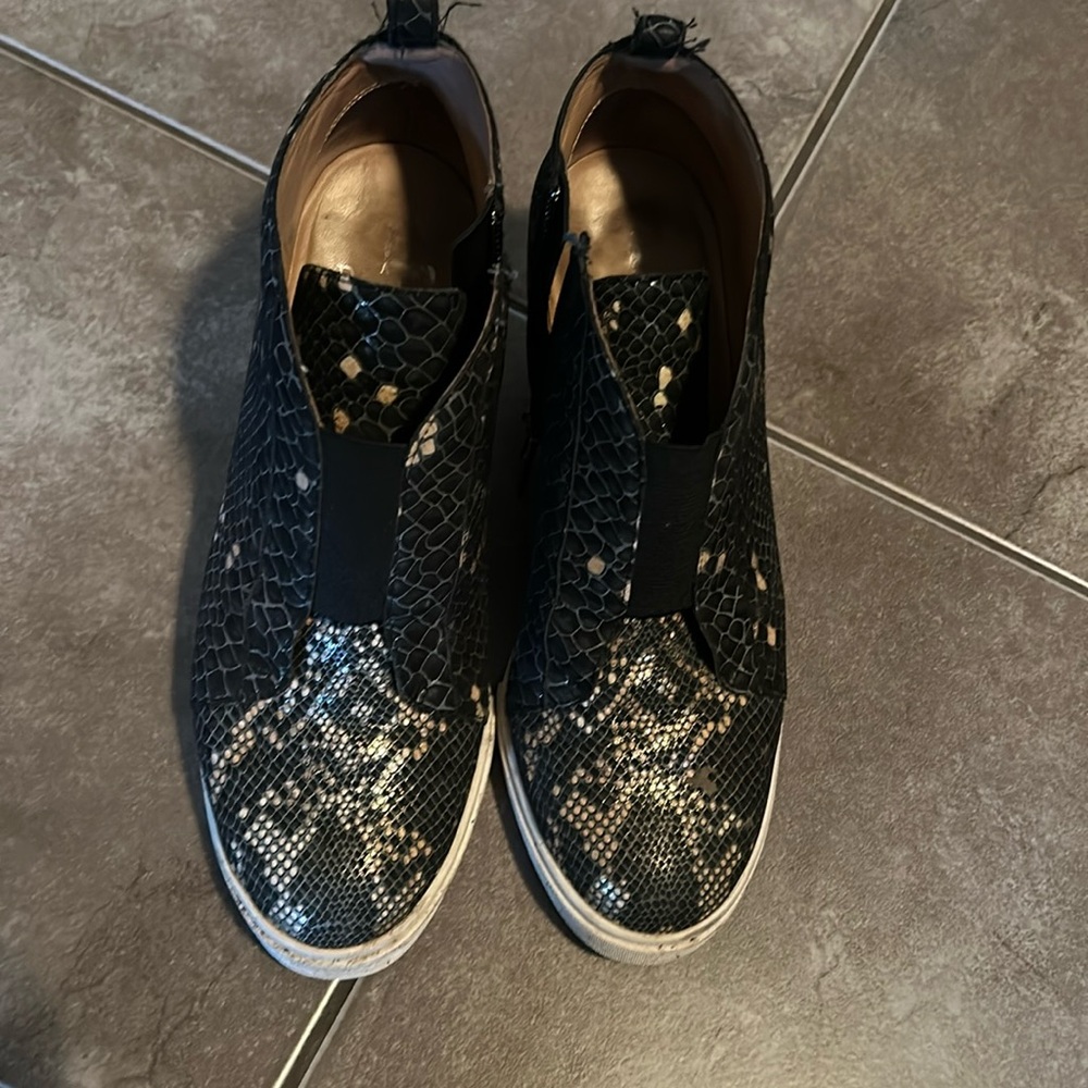 Paolo side zip wedge booties. Snake skin pattern black and gold